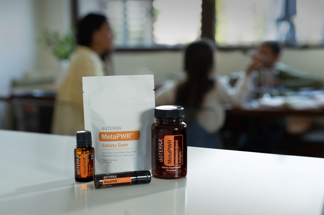 A selection of essential oil products displayed indoors, focused on wellness.